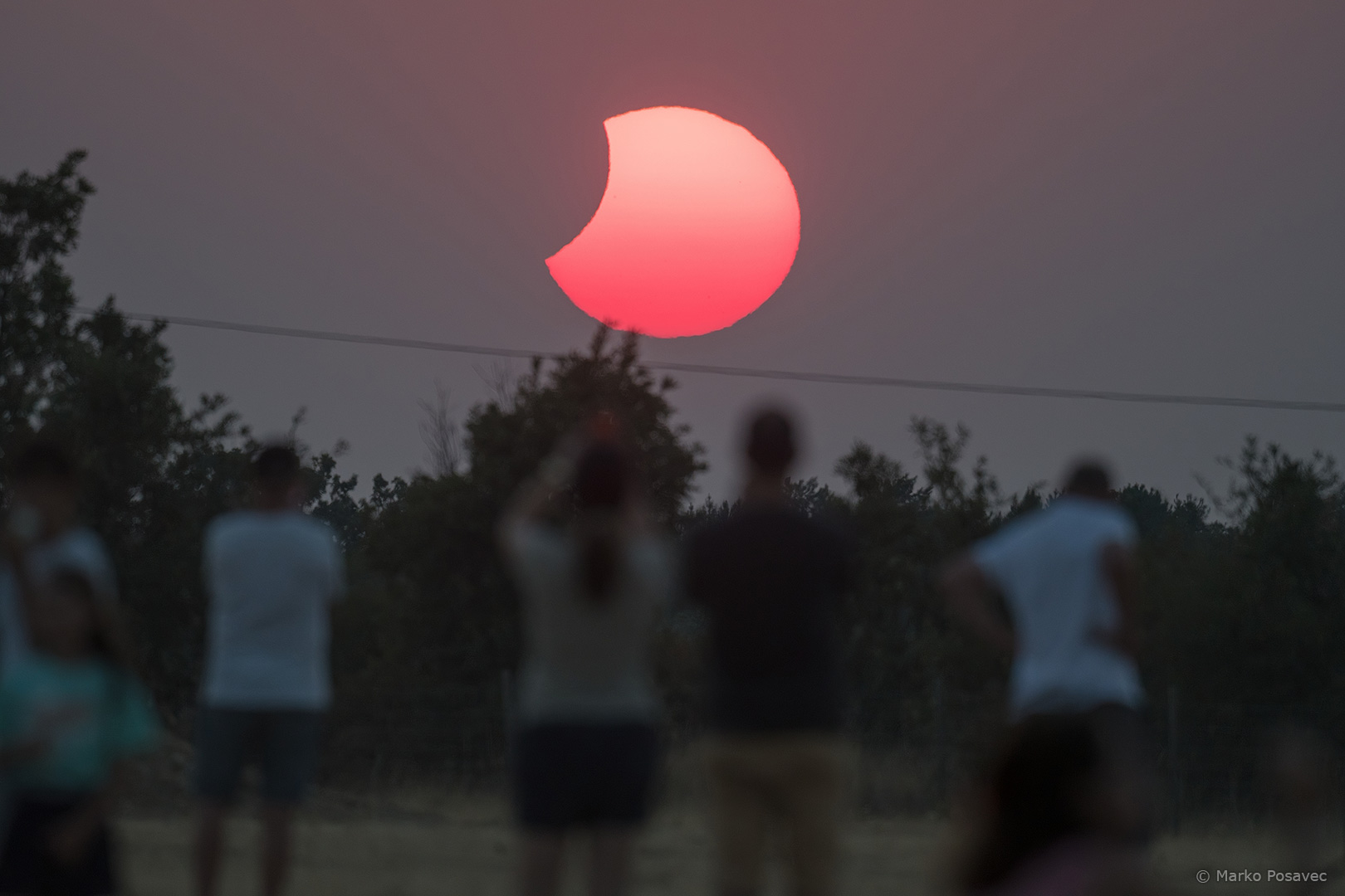Zalazak djelomično pomračenog Sunca